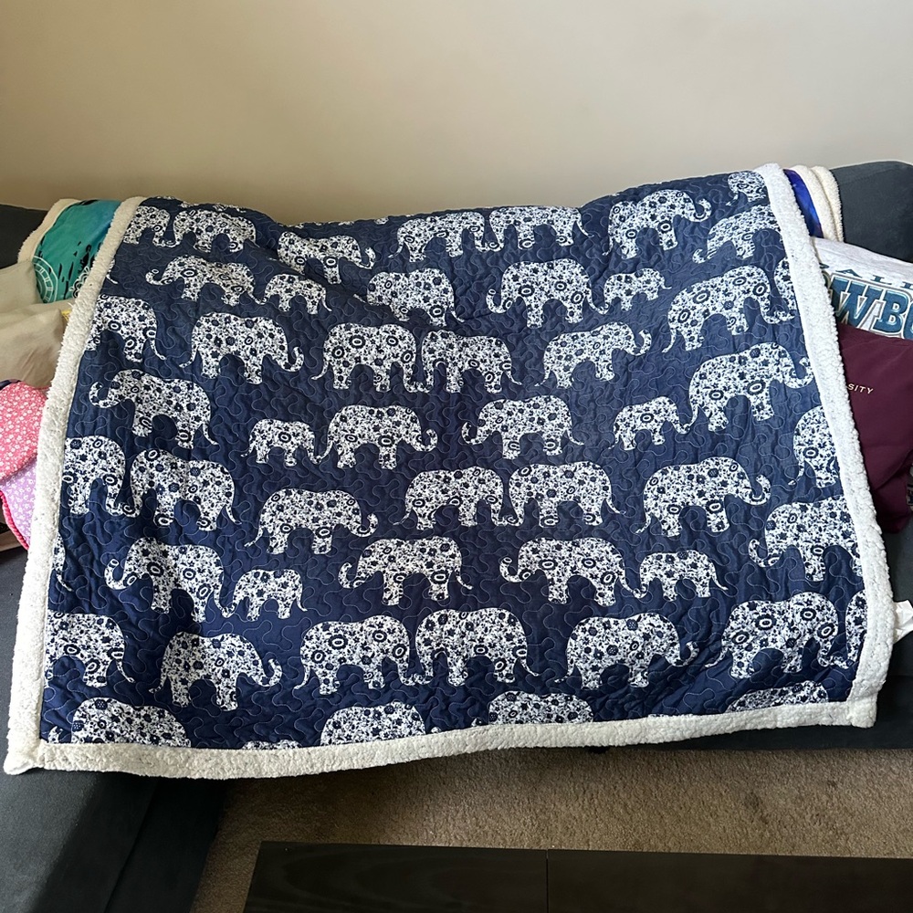 Elephant Patterned Blue and White Quilt